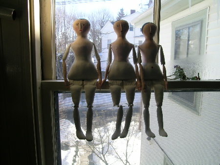 dolls in the window